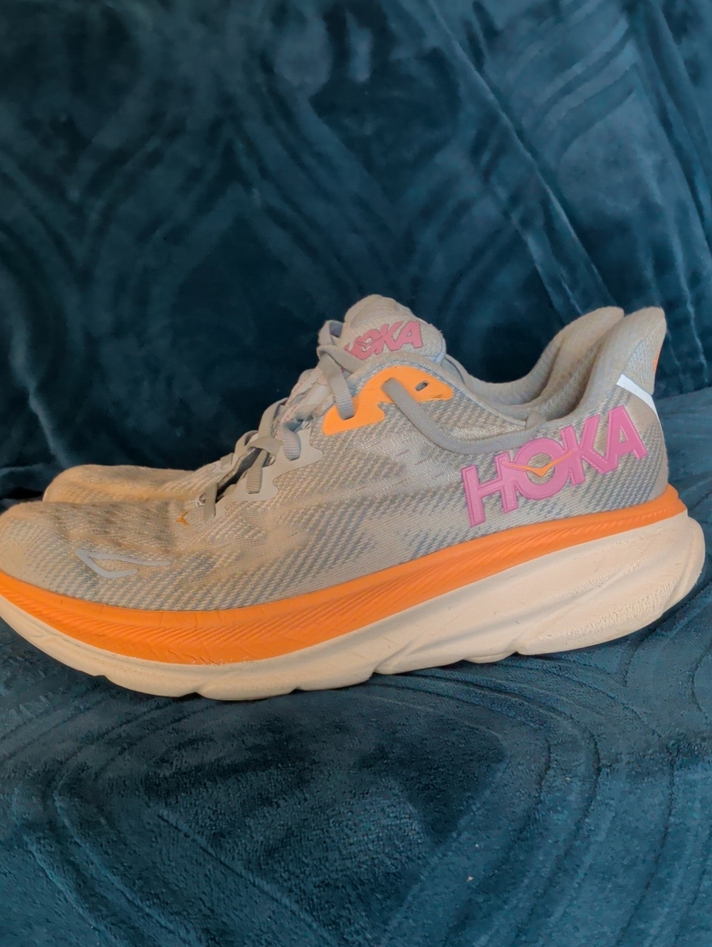 Hoka Clifton 9 Women's Light Blue Running Shoe with Orange Midsole and Pink Logo